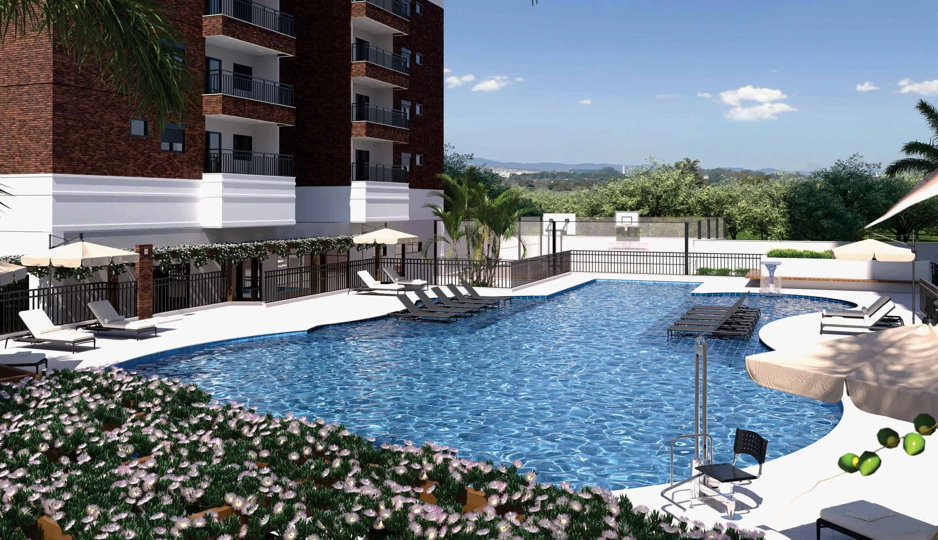 Piscina do Bothanic Parc Residence com espreguiçadeiras, jardim florido e a cidade ao fundo