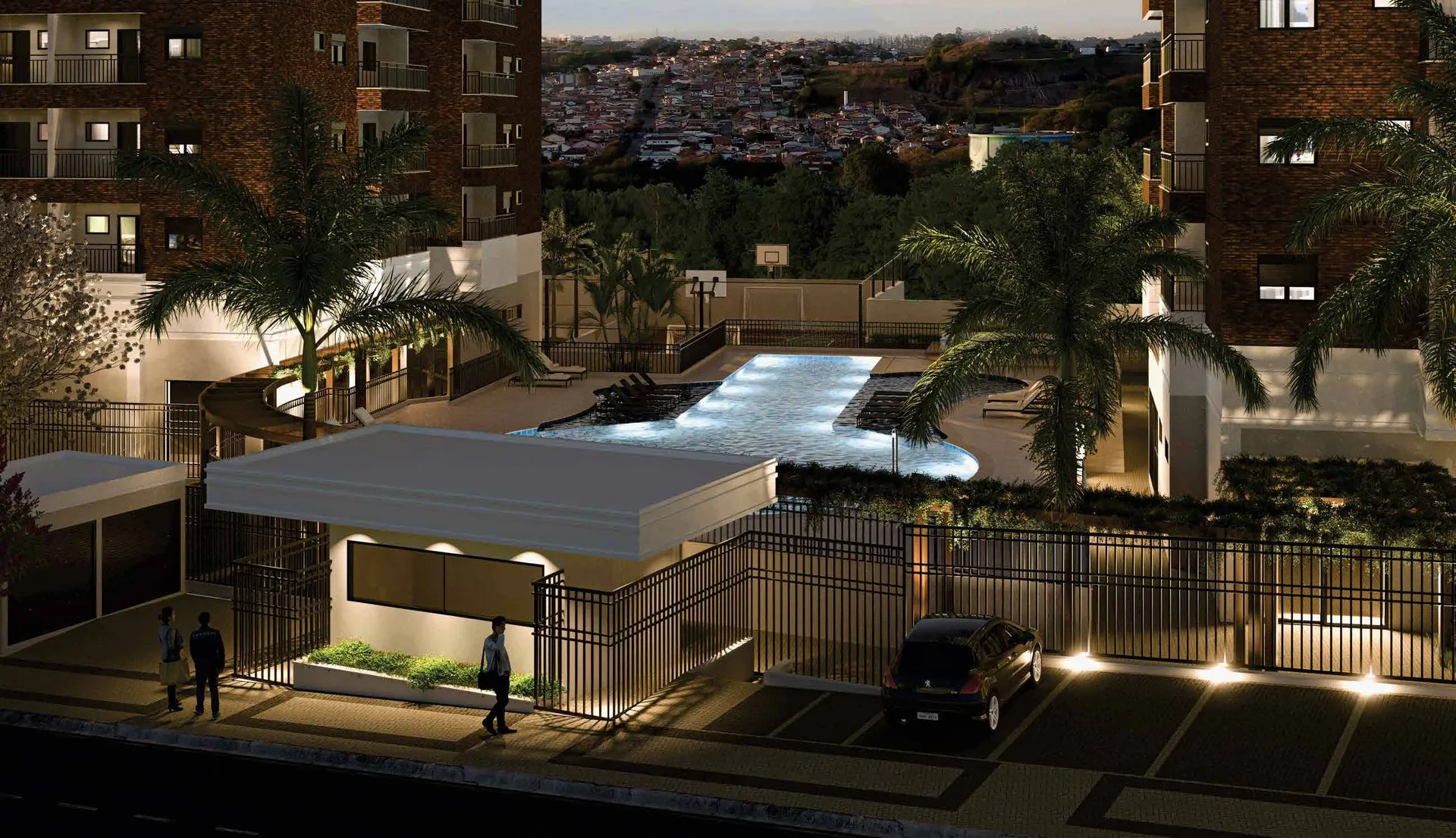 Entrada do Bothanic Parc Residence à noite, com a portaria e as piscinas iluminadas entre as torres