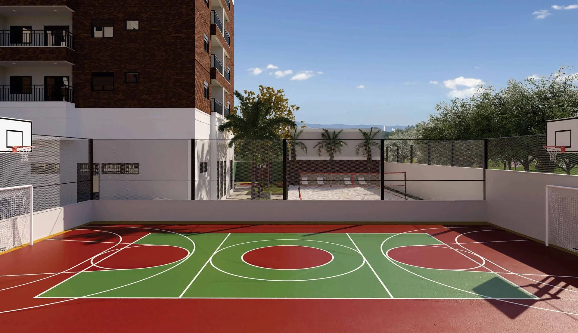 Quadra poliesportiva do Bothanic Parc Residence, com tabelas de basquete e alambrado