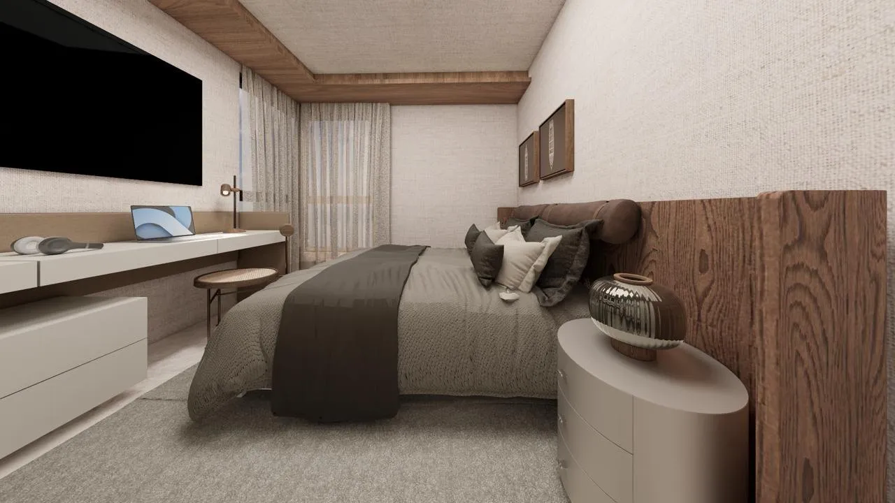 Dormitório do Úniko Vila Ema, com cama de casal, painel de madeira e escrivaninha